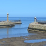 Low tide inside piers at Whitby