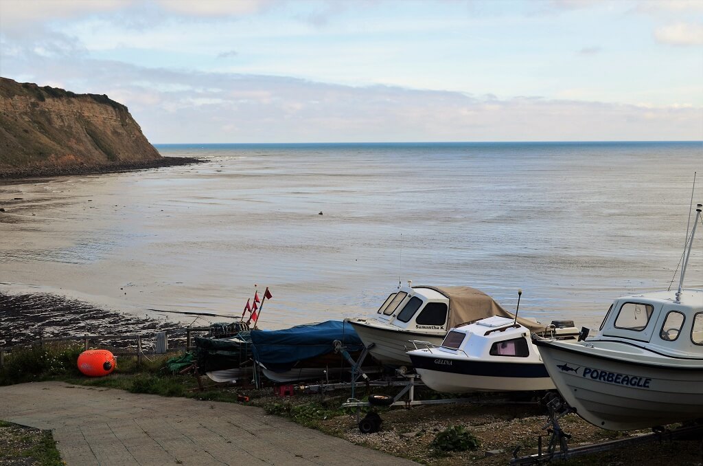 Boats on land and slipway at Robin Hoods Bay